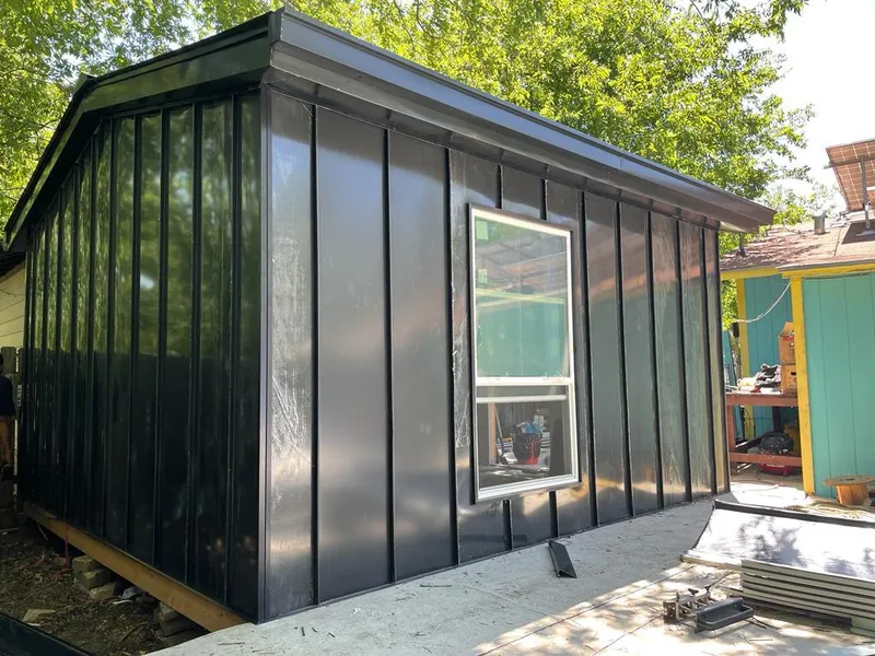 Black standing seam metal wall panels for Metal Roof Installation in Algoma