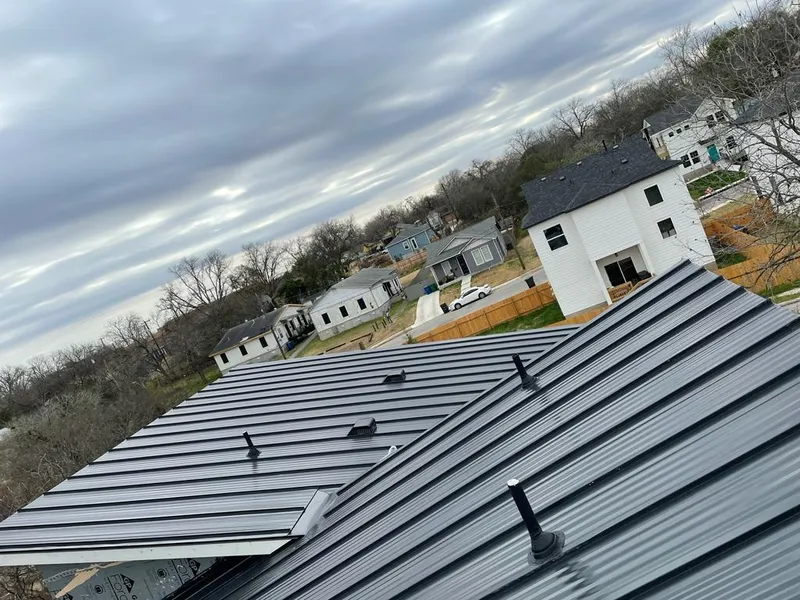 Standing seam metal roof panels with vents for Skylight Repair in Algoma